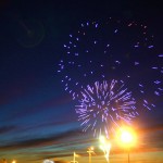Fireworks against sky